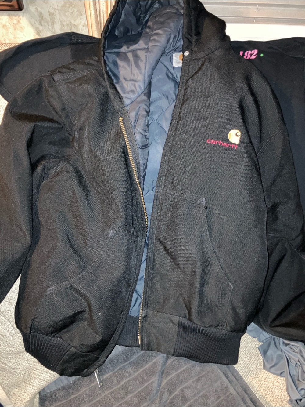 Carhartt black jacket , pockets , great shape men’s size L